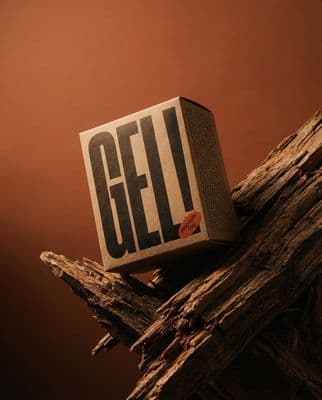 a box sitting on top of a piece of wood