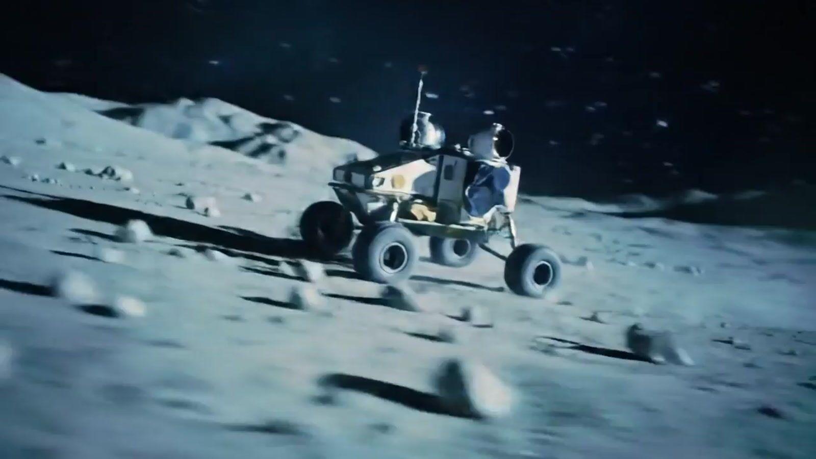 a man riding on the back of a truck on top of a moon
