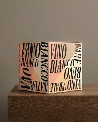 a wooden box sitting on top of a wooden table