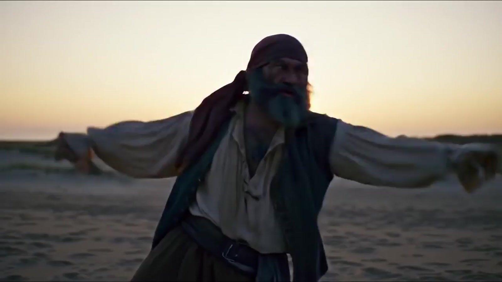 a man with a beard and a beard wearing a pirate costume