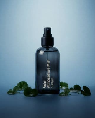a bottle of body lotion sitting on a table