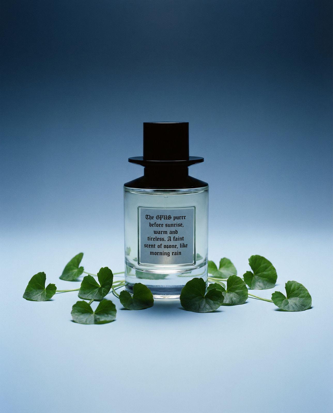 a bottle of perfume sitting on top of a table