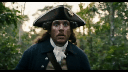 a man in a pirate costume with a surprised look on his face