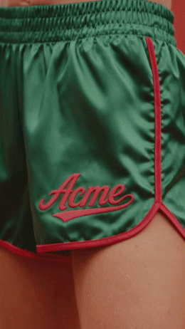 a close up of a woman's shorts with a name on it
