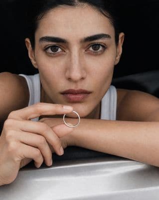 a woman with a ring on her finger