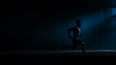 a man running in the dark in the dark