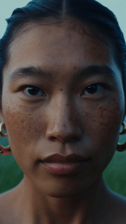 a close up of a person with freckles on her face