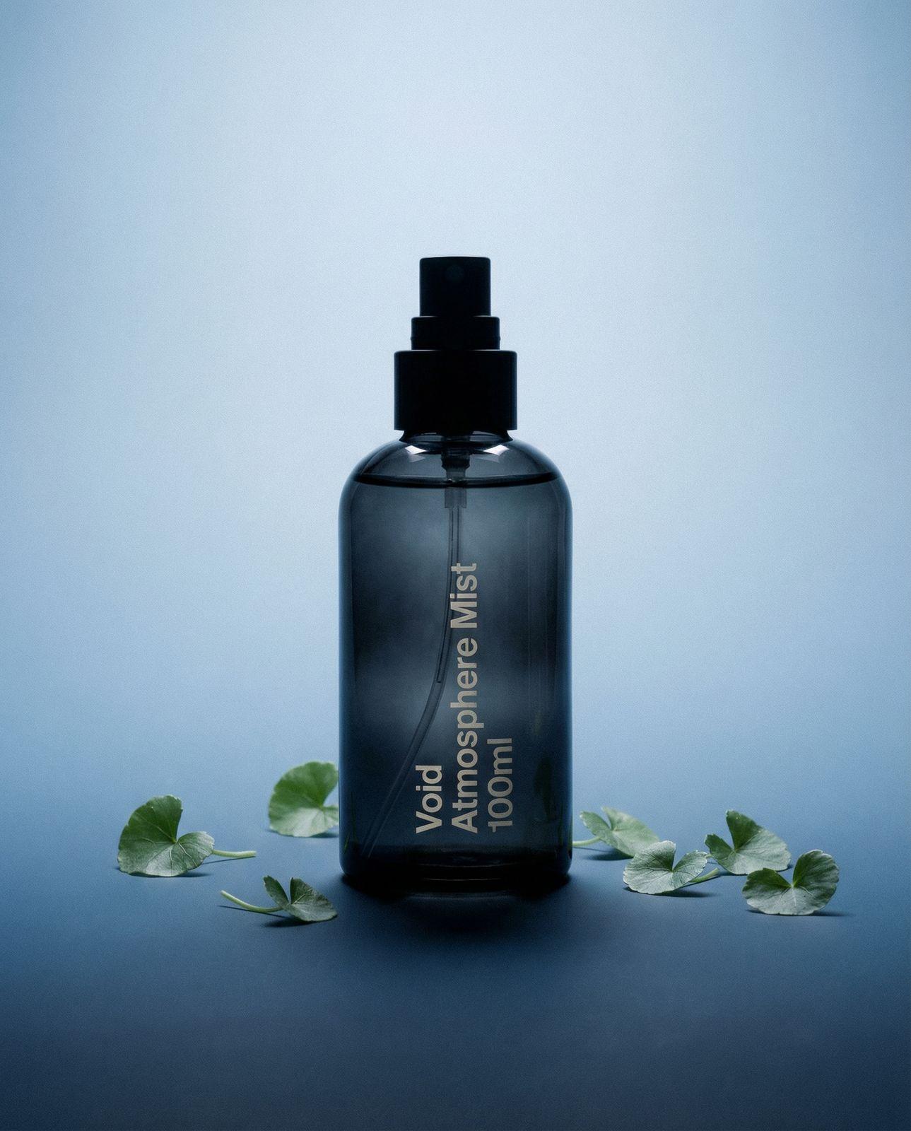 a bottle of cologne sitting on top of a table