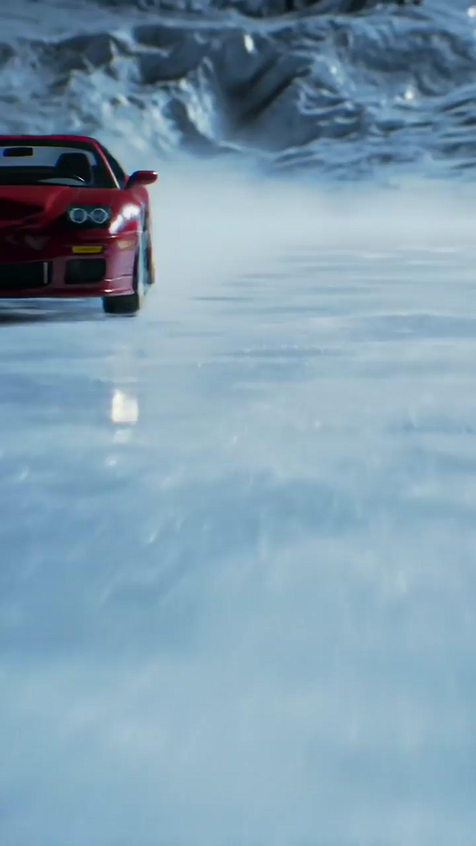 a red sports car driving on a frozen lake