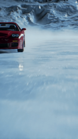 a red sports car driving on a frozen lake