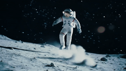 a man in a space suit standing on the moon