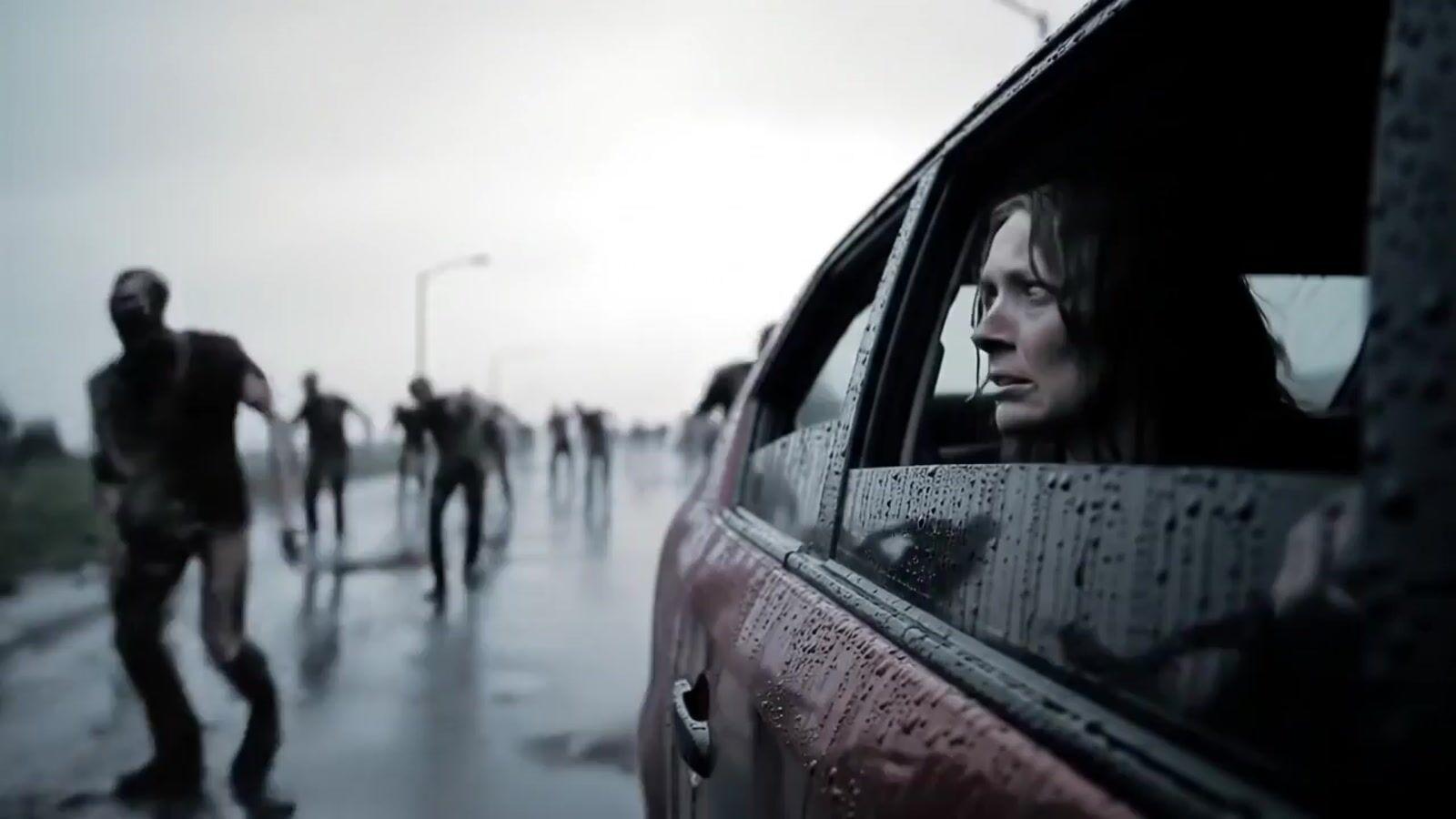 a group of people walking on a wet road