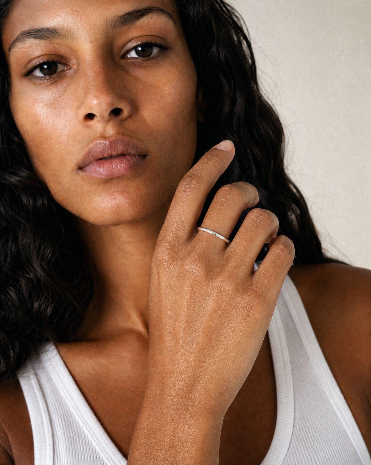 a woman with a ring on her finger