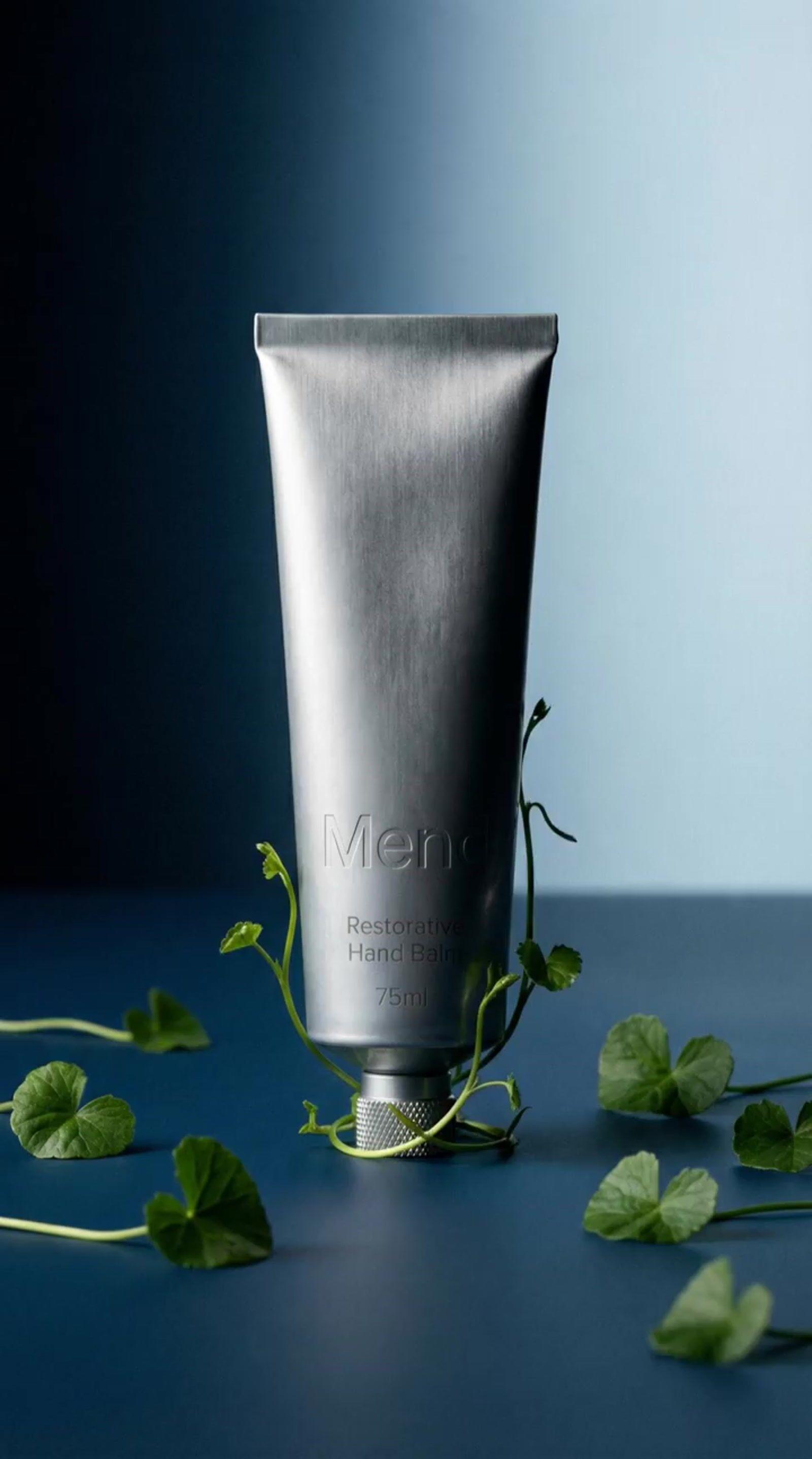 a tube of men's body lotion sitting on a table