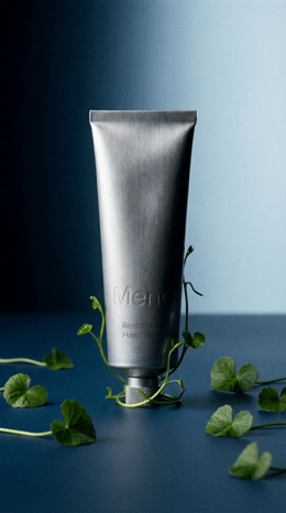 a tube of men's body lotion sitting on a table