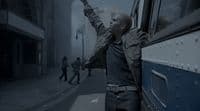 a man leaning out the window of a bus
