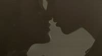 a couple of people that are kissing each other