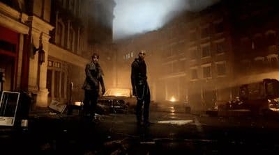 a couple of men standing next to each other on a street
