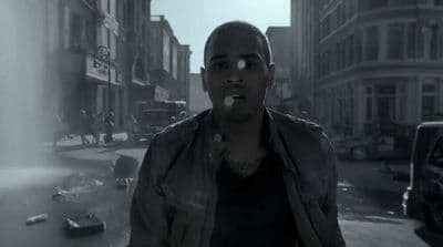 a man standing in the middle of a street