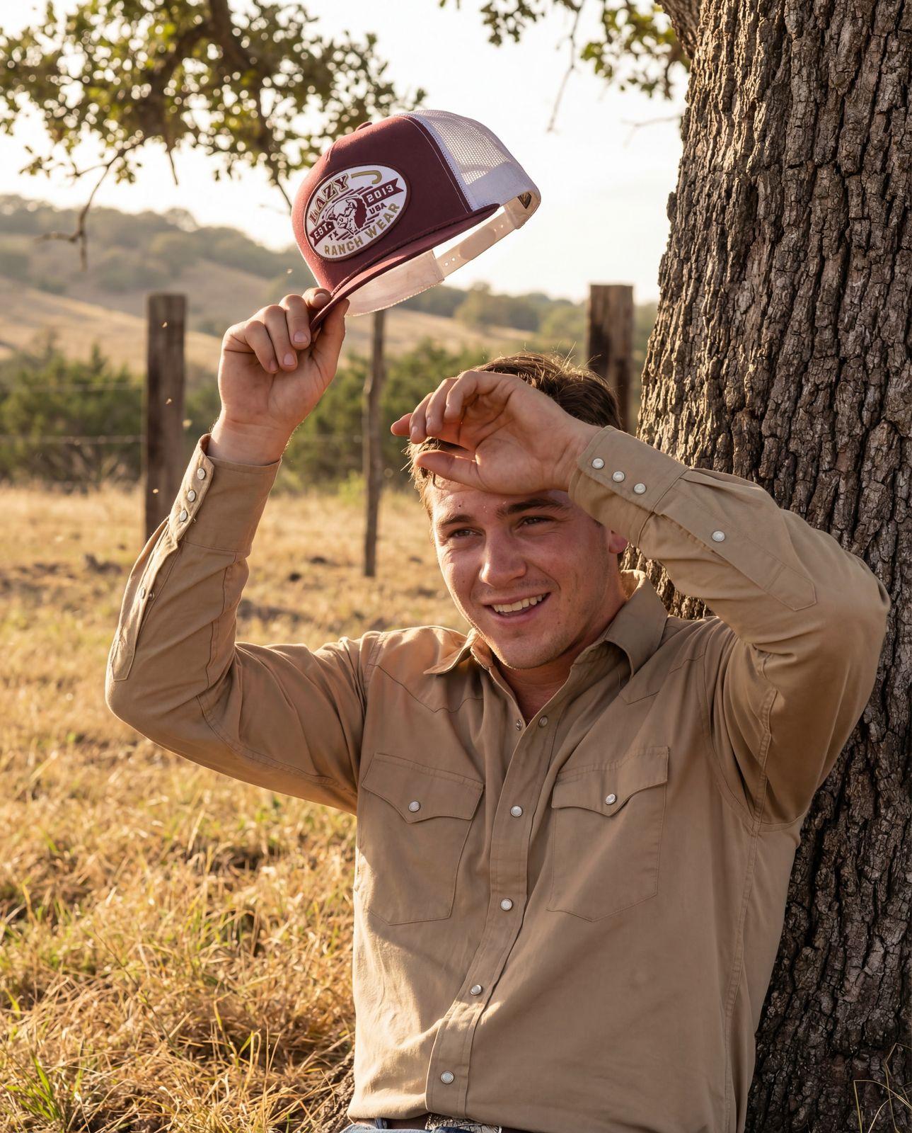 a man holding a hat up to his head
