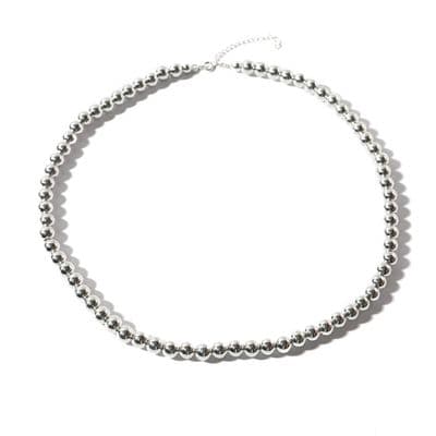 a silver beaded necklace on a white background