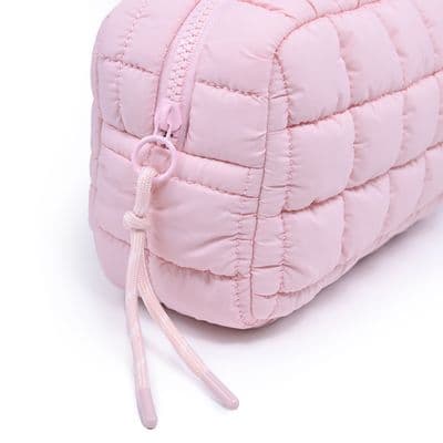 a pink bag with a zipper on it