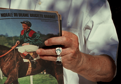 a person holding a ring in their hand