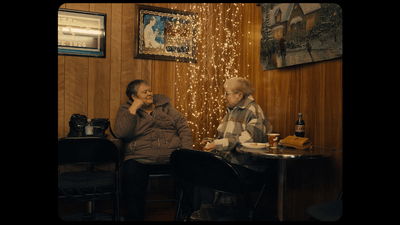 a couple of people sitting at a table