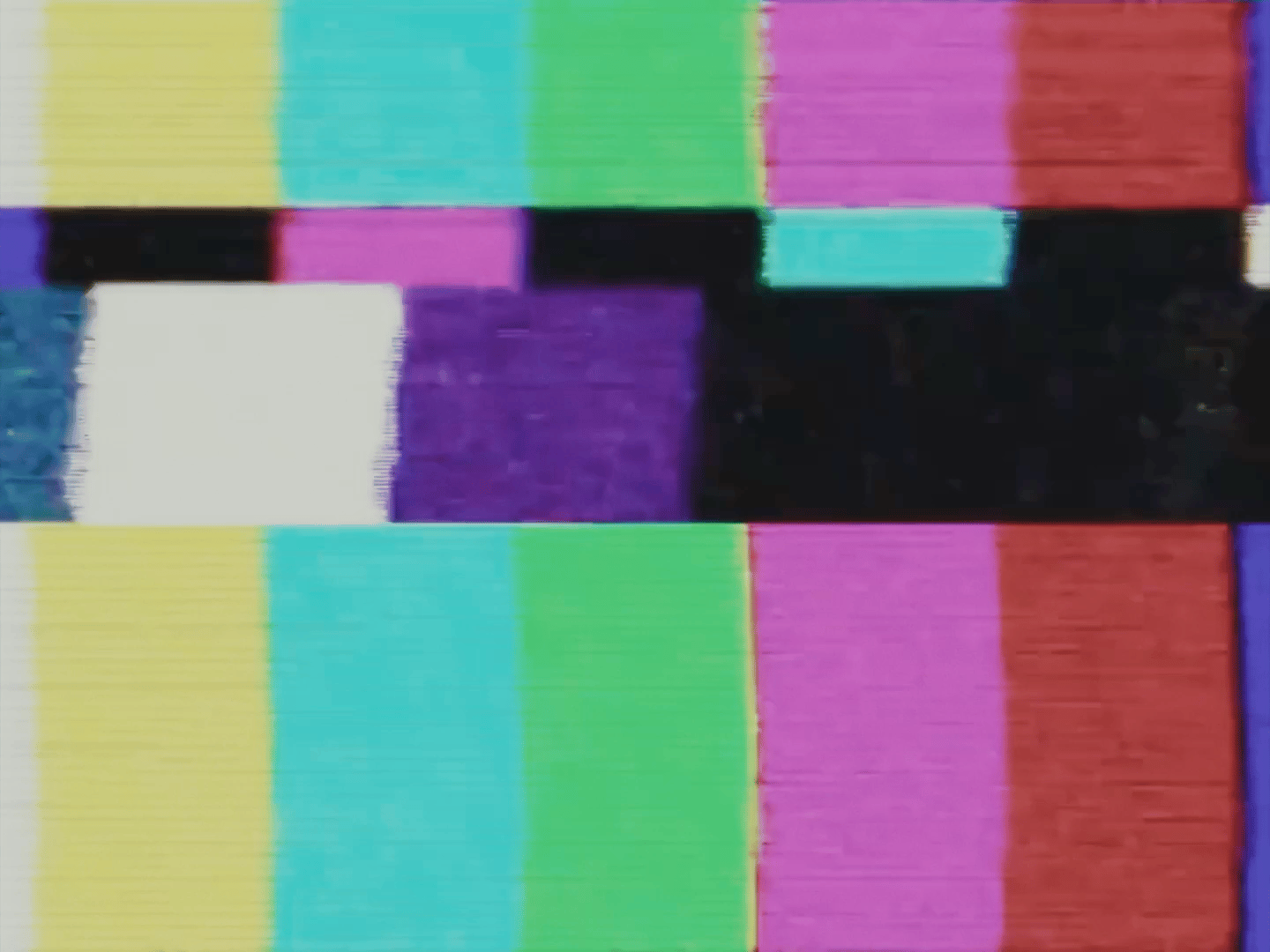 a picture of a multicolored wall with a black background
