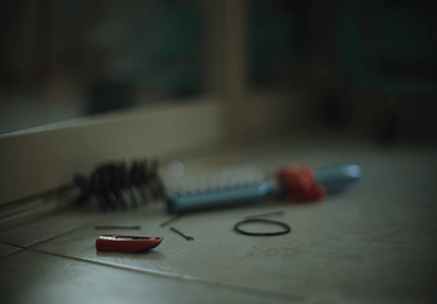 a couple of toothbrushes sitting on top of a counter