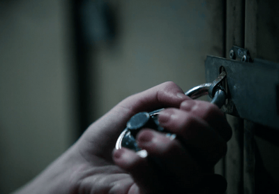 a person holding a bunch of keys in their hand