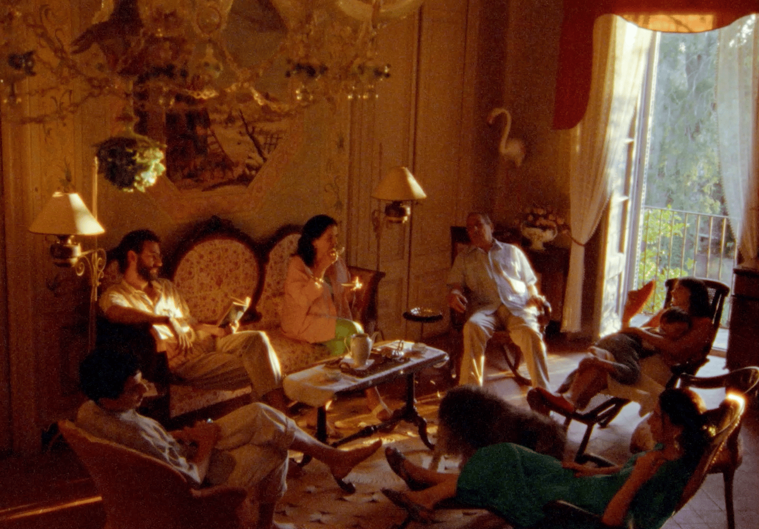 a group of people sitting around a living room