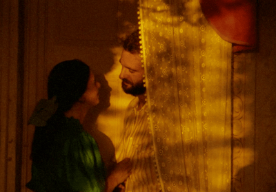a man and a woman standing next to each other