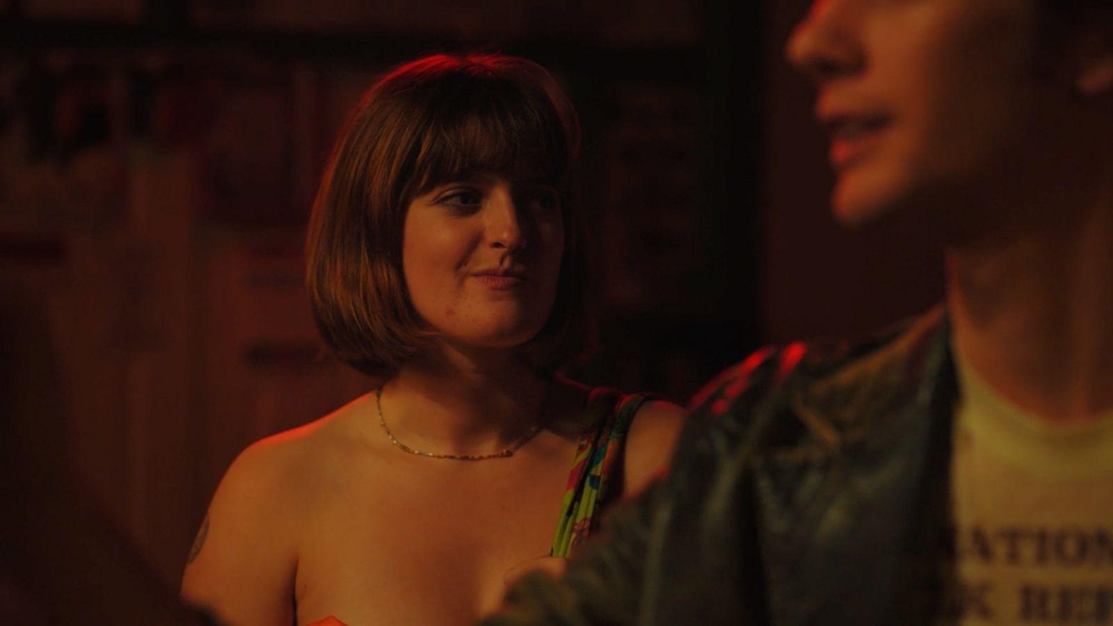 a man and a woman standing next to each other