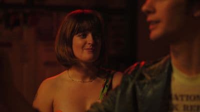 a man and a woman standing next to each other