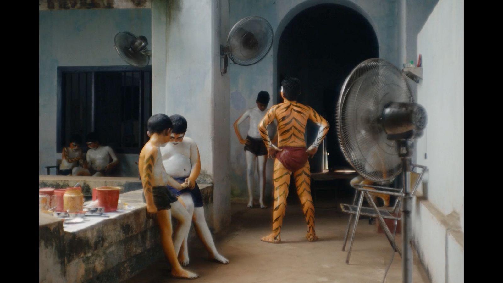 a group of mannequins are standing in a room
