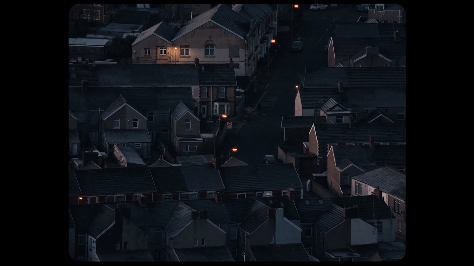 an aerial view of a city at night