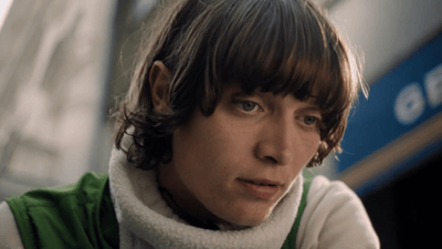 a man with a scarf around his neck