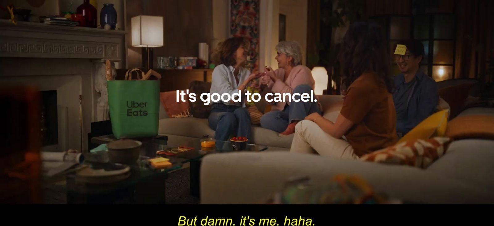 a group of people sitting on a couch in a living room
