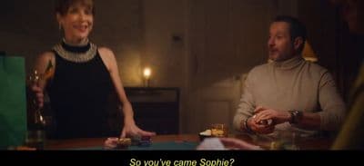 a couple of people that are sitting at a table