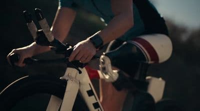 a close up of a person riding a bike