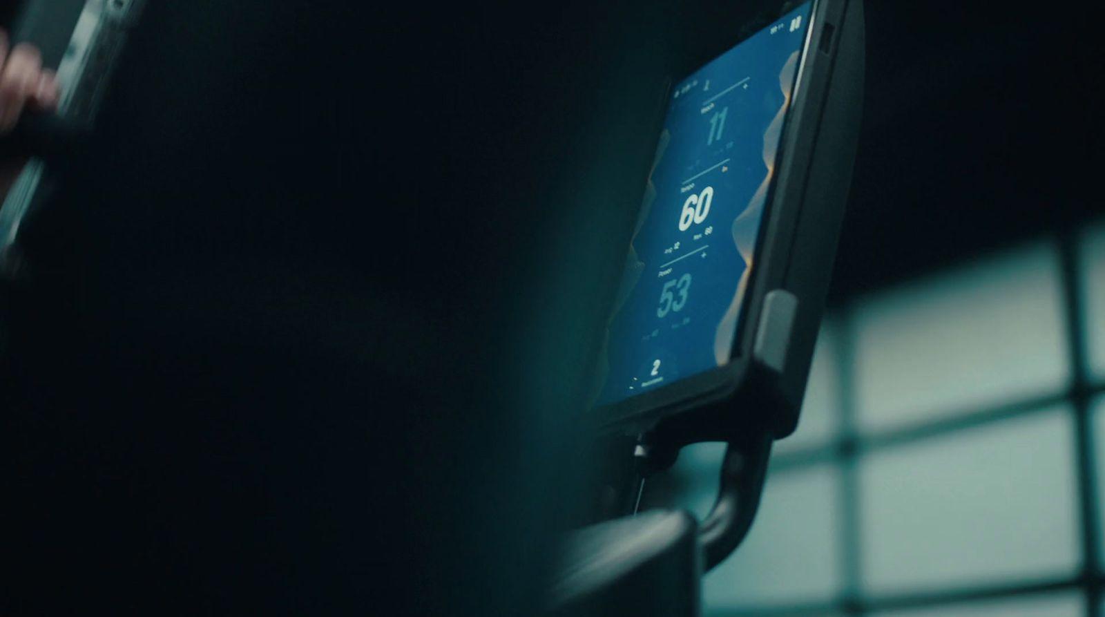 a close up of a cell phone on a stand