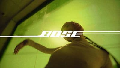 a man holding a tennis racquet on top of a tennis court