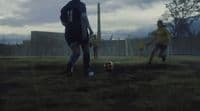 a group of young men playing a game of soccer