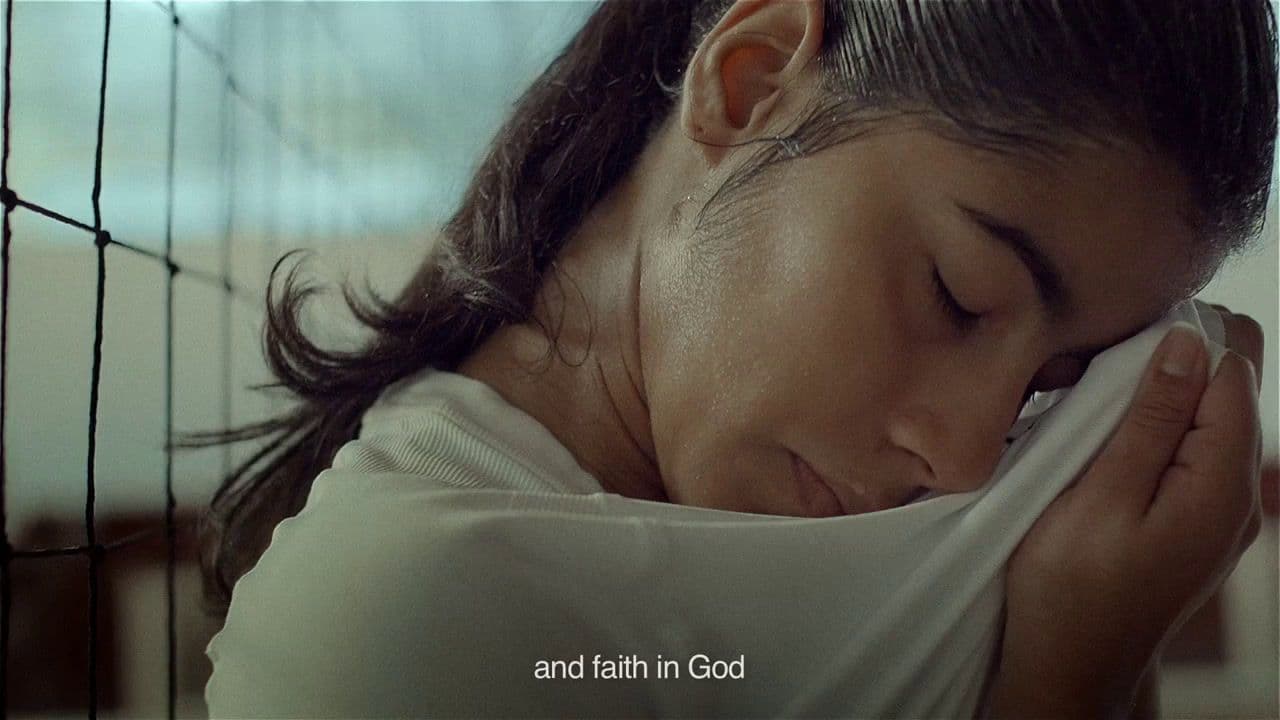 a woman with her head in her hands