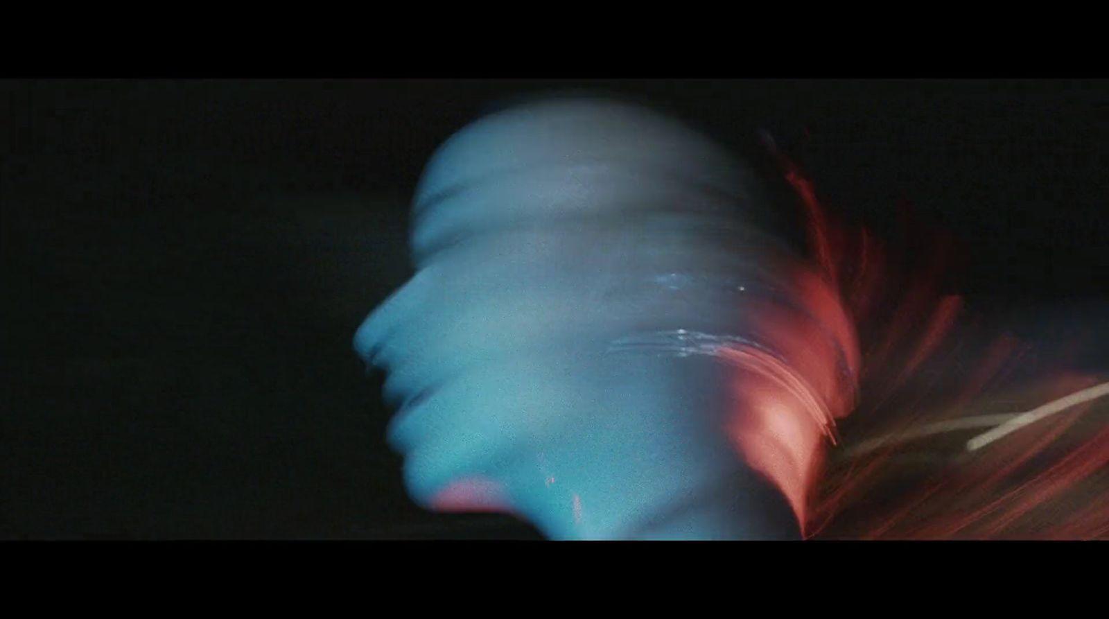 a blurry photo of a blurry object in the dark