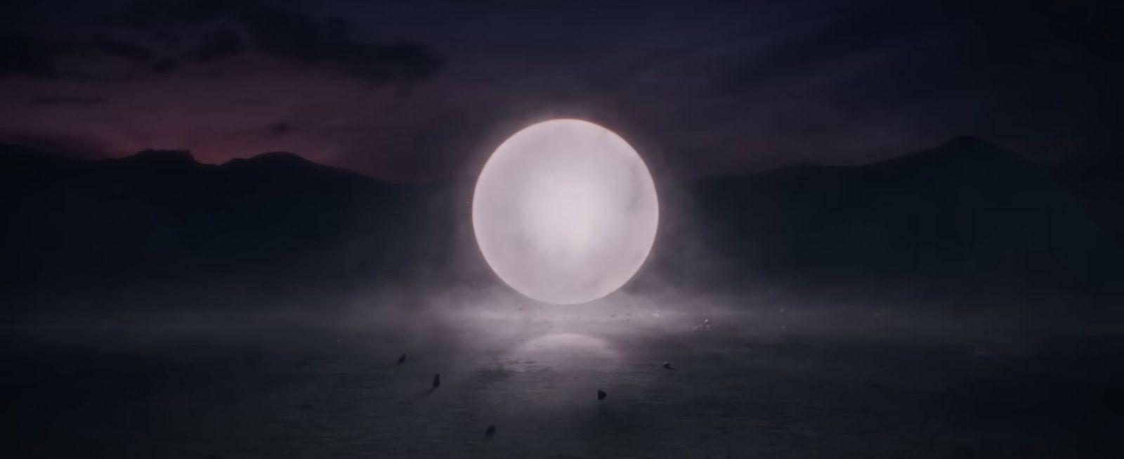 a large white object in the middle of a field