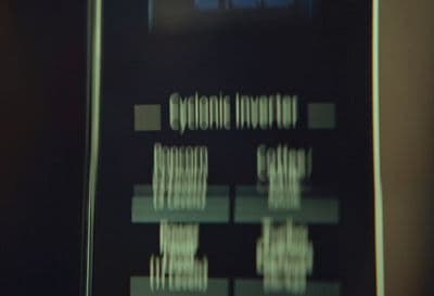 a close up of a cell phone with a blurry background