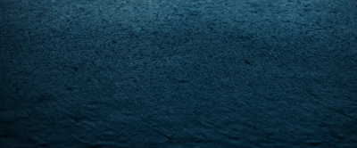 a black and white photo of a blue wall