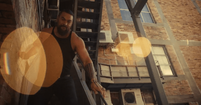a man with a beard is climbing a set of stairs